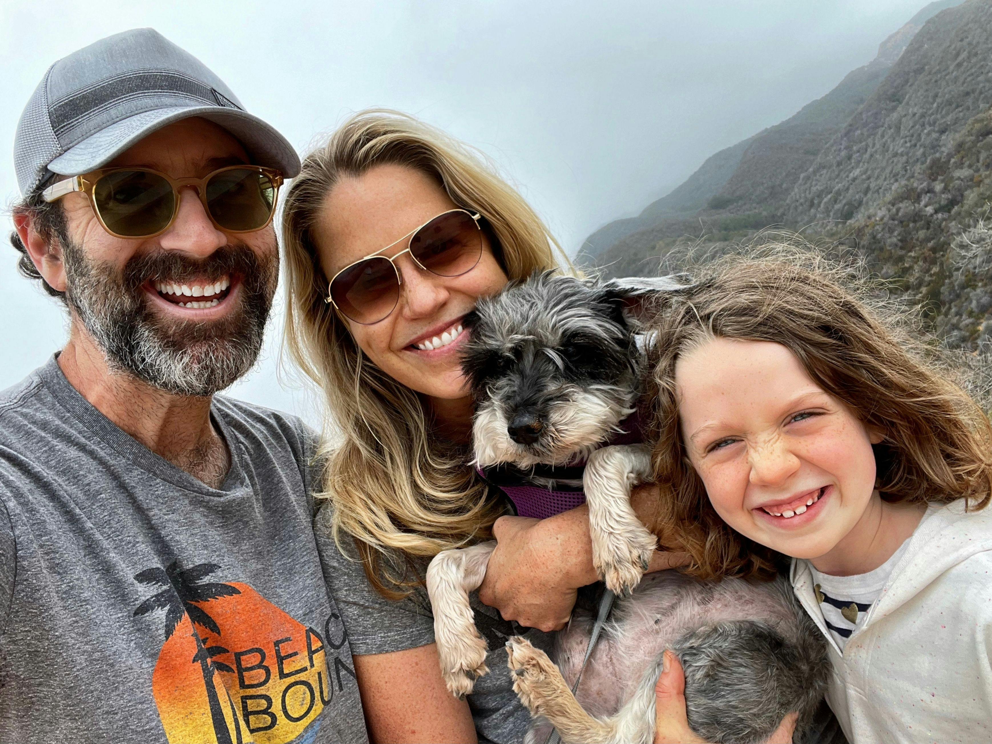 Jessica St. Clair and Dan O'Brien with the daughter, Bebe, living out the "heck yes" attitude they adopted during cancer treatment. 